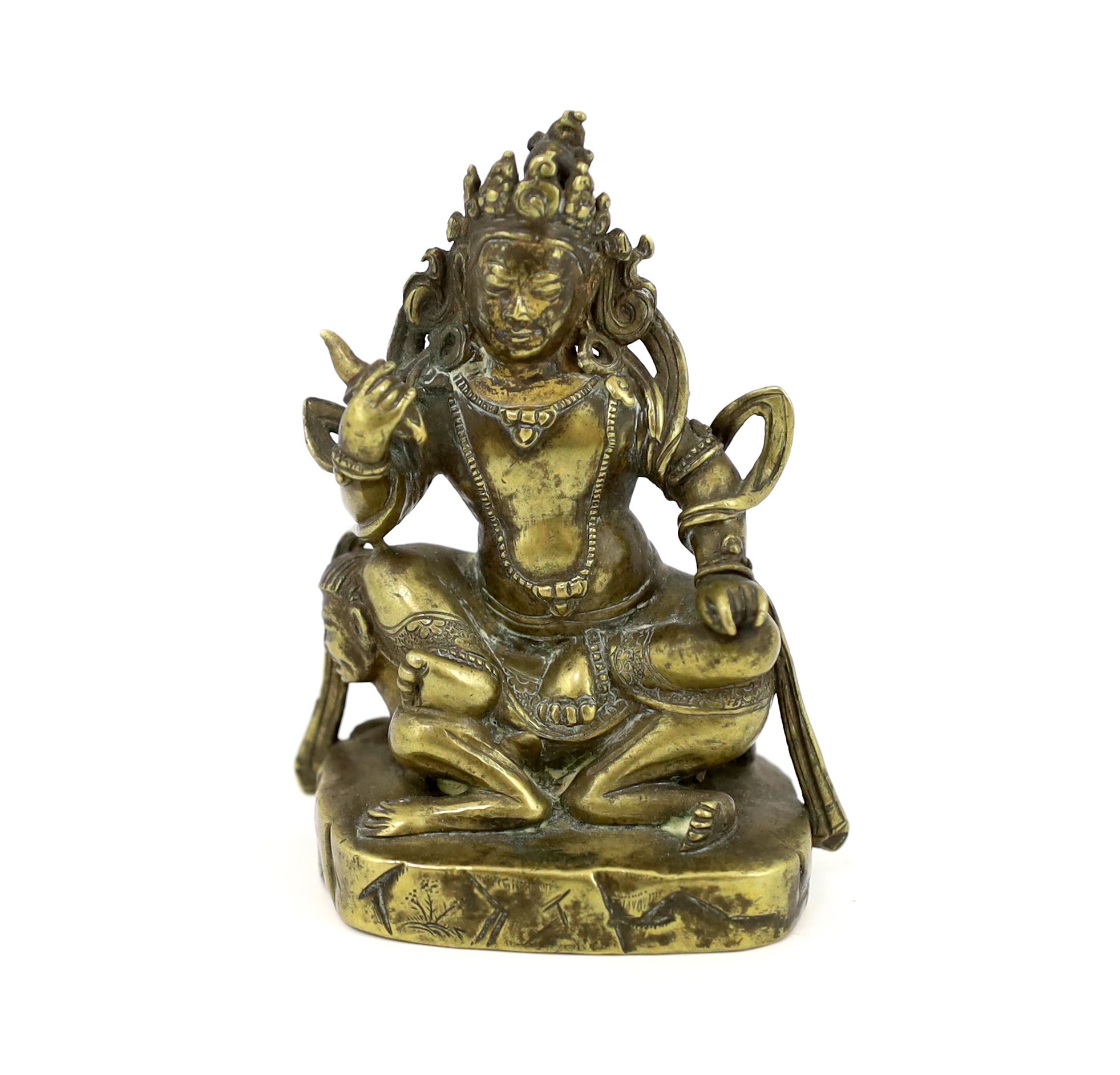A Tibetan gilt bronze figure of a deity, 17th century